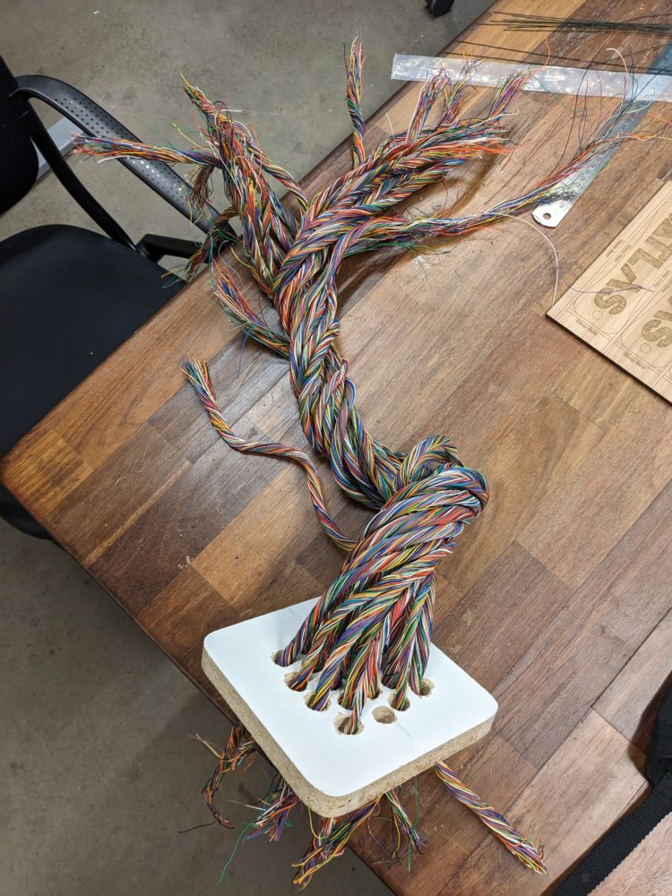 Initial twist of the telephone cable into the shape of a trunk. It was unstable and needed a supporting rod in the center