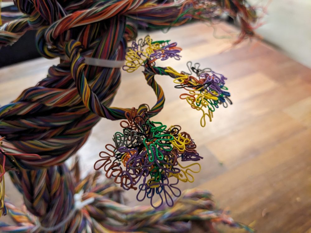 Closer look at the bunches of leaves created from folding individual strands of wire